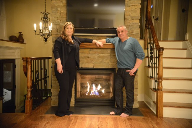 Vikki and John Ruisch put in two fireplaces when they had their house renovated in 2013, one in the master bedroom and another in the living room. (The Record/MCT)
