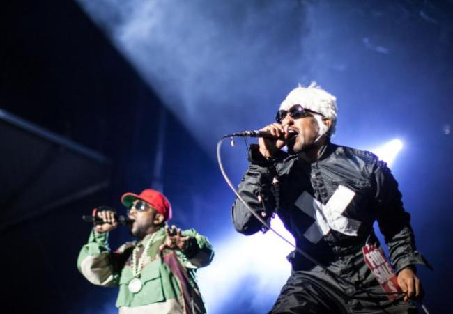 Big Boi (left) and Andre 3000 of Outkast perform at CounterPoint 2014 in Rome, Georgia, Sunday. (AP)