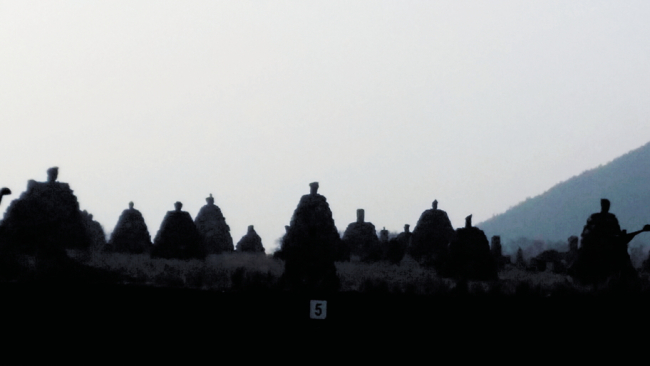 Towers of the 500 Generals at Jeju Stone Park at dusk (Kim Hoo-ran/The Korea Herald)