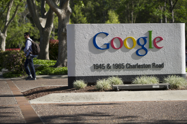 A pedestrian walks outside Google’s headquarters in Mountain View, California. (Bloomberg)