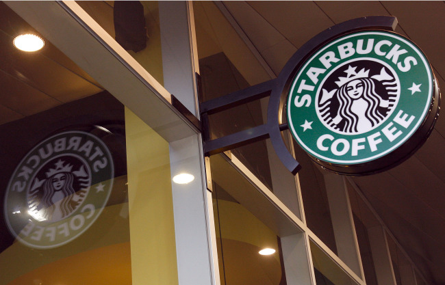 The logo for Starbucks Corp. is displayed in Melbourne, Australia. (Bloomberg)