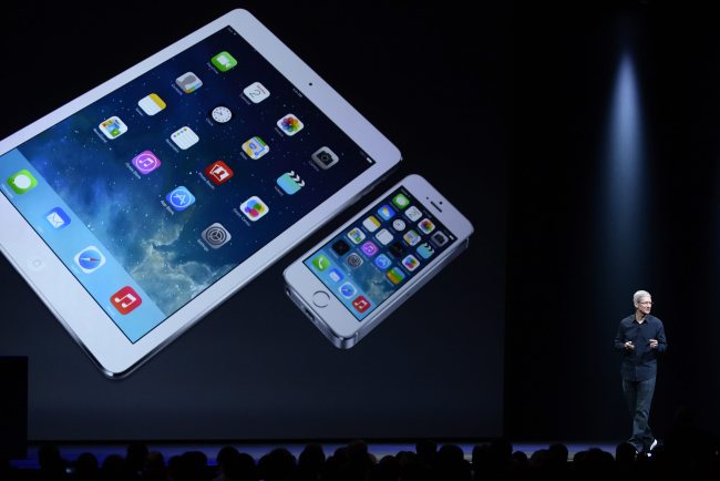 Apple CEO Tim Cook introduces the new iOS 8 at the Apple Worldwide Developers Conference in San Francisco on Monday. (EPA-Yonhap)