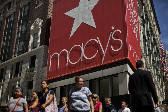 Shoppers walk past a Macy’s Inc. store in New York. (Bloomberg)