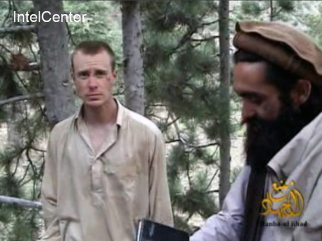 This image made from video released by the Taliban and obtained by IntelCenter on Dec. 8, 2010, shows a man believed to be Bowe Bergdahl at left. Bergdahl, a U.S. Army soldier, went missing from his outpost in Afghanistan in June 2009 and was released from Taliban captivity on May 31, 2014 in exchange for five enemy combatants held in the U.S. prison in Guantanamo Bay, Cuba. (AP)