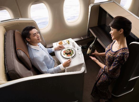 A customer is served in Singapore Airlines’ first class section.