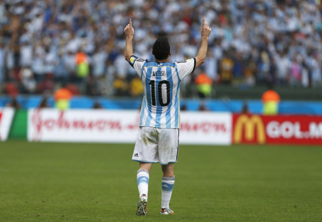 Argentina's Lionel Messi celebrates after scoring his side's second goal during the group F World Cup soccer match against Nigeria at the Estadio Beira-Rio in Porto Alegre, Brazil, Wednesday. (AP)