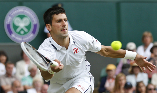 Novak Djokovic returns the ball to Radek Stepanek during the All England Lawn Tennis Championships in Wimbledon, London, Wednesday. (AP-Yonhap)