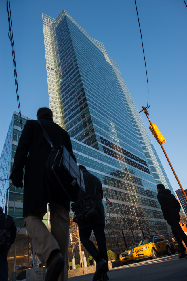 People walk outside Goldman Sachs’ headquarters in New York. (Bloomberg)