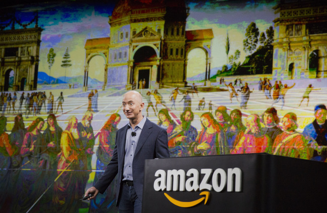 Jeff Bezos, CEO of Amazon.com Inc., unveils the Fire Phone during an event at Fremont Studios in Seattle on June 18. (Bloomberg)