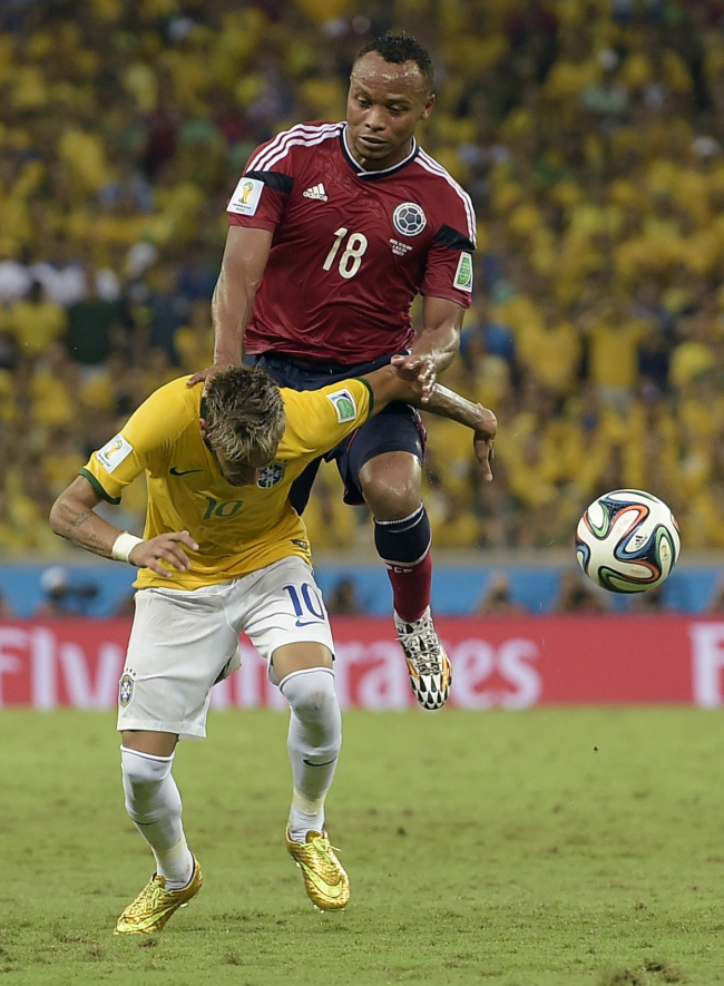 Brazil’s Neymar is fouled by Colombia’s Camilo Zuniga during the World Cup quarterfinal match between Brazil and Colombia on July 4. (AP-Yonhap)