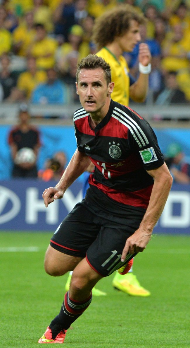 Miroslav Klose of Germany celebrates after scoring the second goal in the FIFA World Cup 2014 semifinal match between Brazil and Germany at the Estadio Mineirao in Belo Horizonte, Brazil, Tuesday. (EPA-Yonhap)