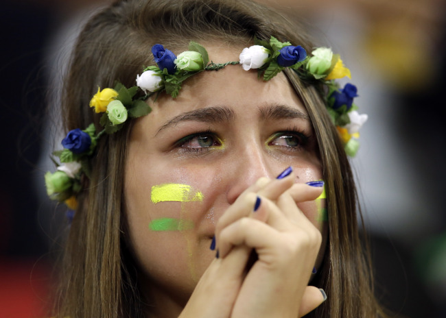 A Brazilian fan cries after the third-place match on Saturday. (AP-Yonhap)