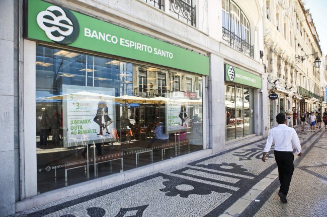 A man passing a Banco Espirito Santo branch in Lisbon. (EPA-Yonhap)