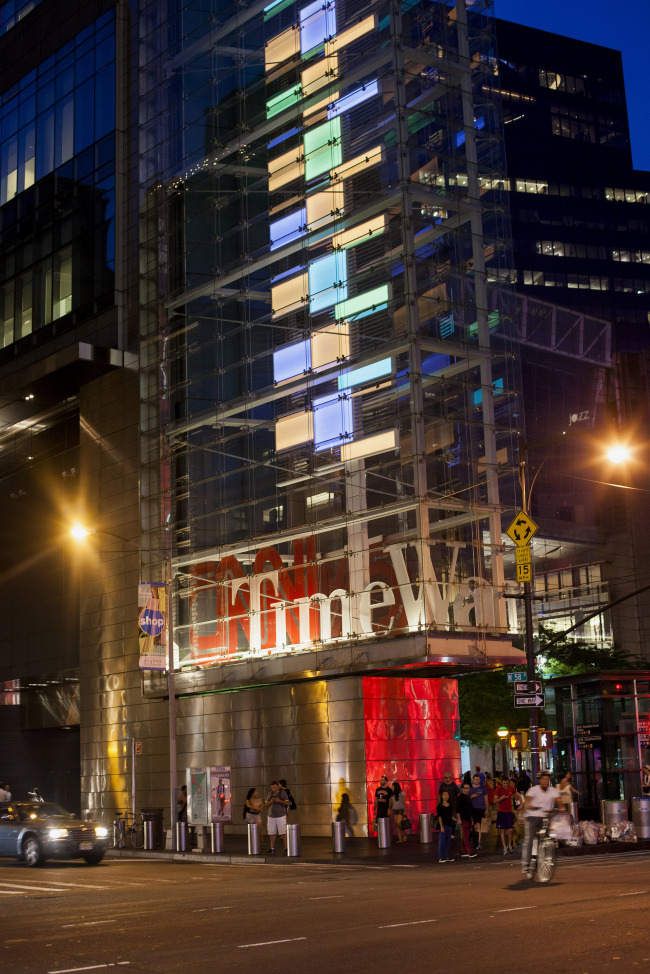 Pedestrians pass the Time Warner Center in New York. (Bloomberg)