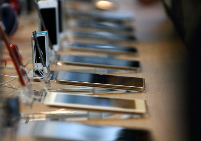 Apple iPads are displayed inside the company’s Omotesando store in Tokyo. (Bloomberg)