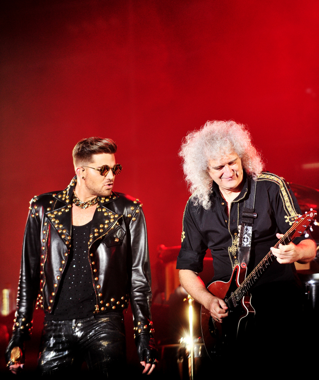 Brian May (right) of Queen and Adam Lambert perform at Auxiliary Stadium at Jamsil Sports Complex on Thursday. ( Live Nation Korea)