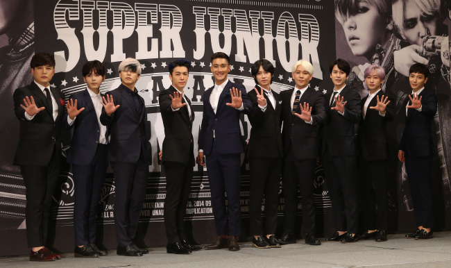 The members of Super Junior pose at a press conference on their new seventh album “Mamacita” at the Imperial Palace Hotel in Gangnam, Seoul, Thursday. (Yonhap)
