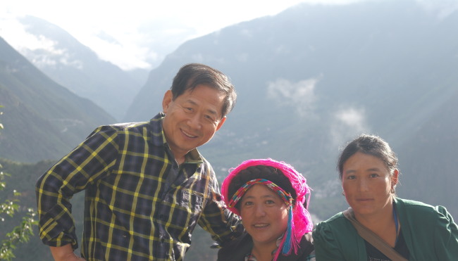 Kim Young-gee (left) poses for a photo in Danba, Tibet.