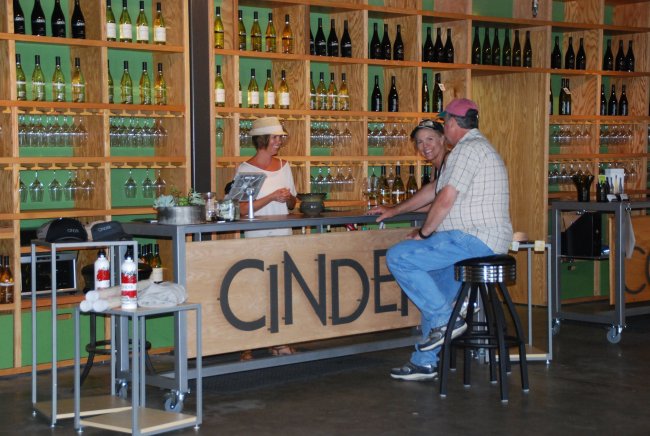 An employee pours beverages for visitors at an urban winery in downtown Boise, Idaho. (Myscha Theriault/MCT)