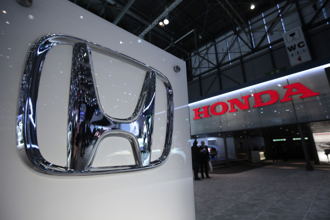 The Honda Motor logo is seen on the company’s stand during the Geneva International Motor Show in Geneva, Switzerland. (Bloomberg)