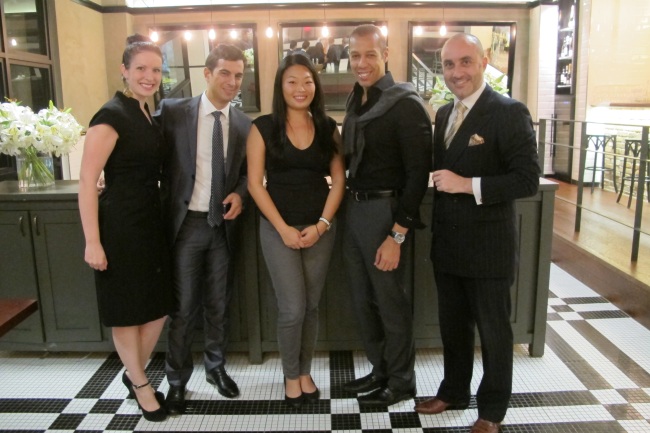 Ernesto Torres Pereyra (second from left), counselor-minister at the Dominican Embassy here, poses with colleagues before the start of a social gathering of the diplomatic community that saw government officials and foreign envoys of some 30 countries mingle in an unofficial event in Seoul on Wednesday. From left: Leah Rutz of the Angolan Embassy; Francesco Cannito of the Italian Embassy; Elena Suh of the Argentine Embassy; Pereyra; and Anthony Gallichio of the Australian Embassy. (Philip Iglauer/The Korea Herald)