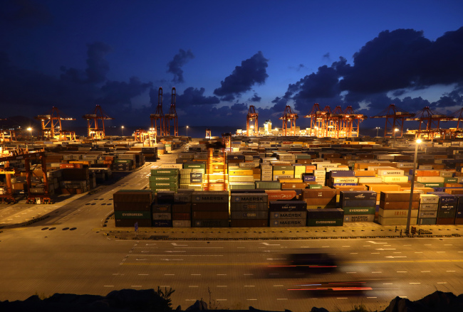 Shipping containers are stacked at the Yangshan Deep Water Port in Shanghai. (Bloomberg)