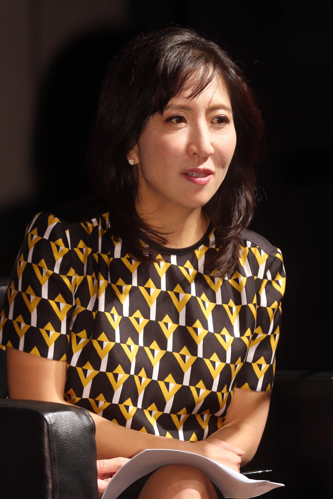 Janice Min, copresident and chief creative officer of Guggenheim Media’s Entertainment Group, gives the opening keynote address at the 2014 MU:CON music conference held at the Blue Square theater in Hannam-dong, Seoul, Monday. (Yonhap)