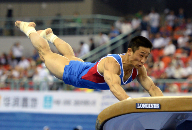 North Korean veteran Ri Se-gwang won his first ever global title Sunday in the men’s vault as South Korea’s defending champion and Olympic gold medalist Yang Hak-seon fell on landing twice. Ri’s triumph followed his compatriot Hong Un-jong’s victory in the women’s vault Saturday at the worlds in Nanning, China. The 29-year-old Ri displayed two technically demanding vaults to collect 15.416 points. (Xinhua-Yonhap)