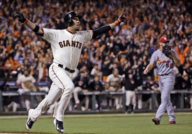 The San Francisco Giants’ Travis Ishikawa reacts after hitting a walk-off three-run home run during the ninth inning of Game 5 of the National League baseball championship series against the St. Louis Cardinals in San Francisco on Thursday. (AP-Yonhap)