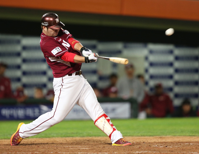 Nexen’s Park Byung-ho led the KBO with 52 home runs and 124 RBIs. ( Yonhap)