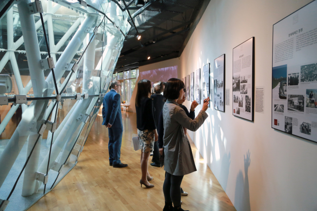 Spectators look at posters outlining the 20th-century history of Europe at the Asan Institute building in Seoul. (Asan Institute for Policy Studies)