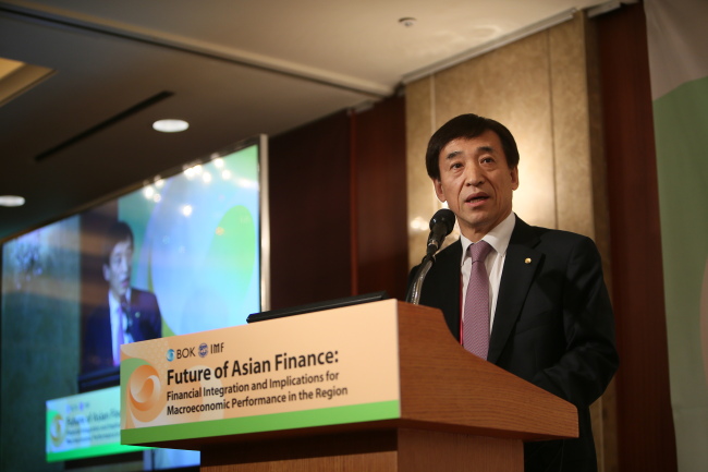 Bank of Korea Gov. Lee Ju-yeol delivers the opening speech at the BOK-IMF joint conference held Monday at Lotte Hotel Seoul. (Bank of Korea)