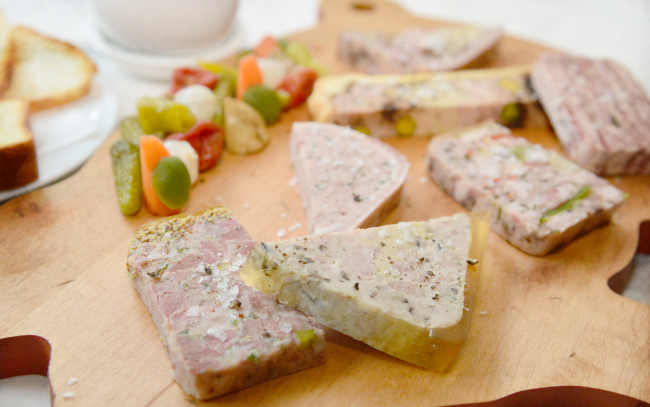 La Cave du Cochon’s selection de charcuterie du moment includes the fromage de tete, the cherry-studded pate en croute and the decadent Lucullus de Valenciennes