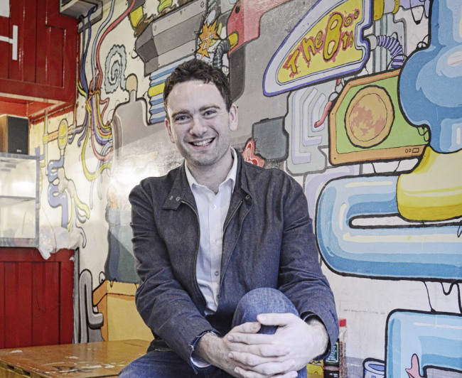 Daniel Tudor poses at The Booth, a craft beer bar near Gyeongnidan-gil in Seoul. (Park Hae-mook/The Korea Herald)