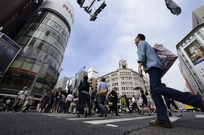 Pedestrians cross a street in the Ginza district of Tokyo. (Bloomberg)