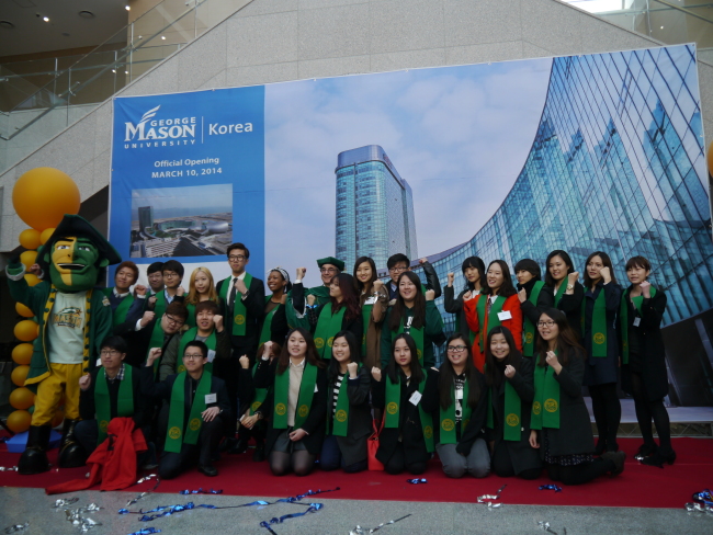 Freshmen of George Mason University Korea pose for a picture during a matriculation ceremony. (AGC)