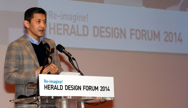Herald Corp. chairman Jungwook Hong delivers a speech during the opening ceremony.
