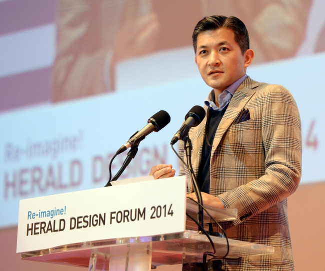 Herald Corporation chairman Jungwook Hong gives the opening speech at the Herald Design Forum 2014 in Dongdaemun Design Plaza in Seoul on Wednesday. (Park Hyun-koo/The Korea Herald)