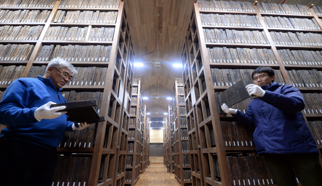 Over 64,000 woodblocks are housed at Jangpangak, a special storage facility of the Advanced Center for Korean Studies in Andong, North Gyeongsang Province, where Lim No-jig is a researcher. (Ahn Hoon/The Korea Herald)