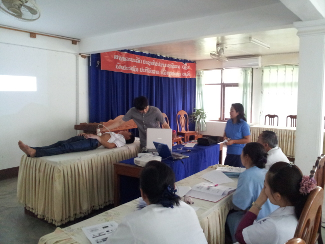 Members of KOHEA demonstrates telemedicine technology in Laos. (KOHEA)