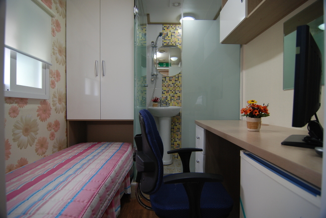 A typical gosiwon room, with basic furniture squeezed into about 4 square meters (gosiwonhome.com)