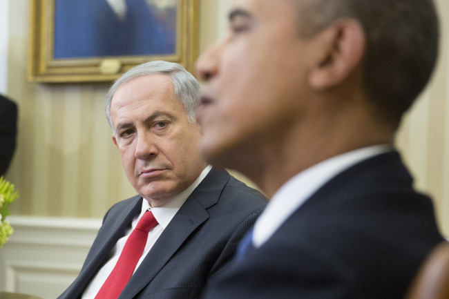Benjamin Netanyahu, Israel’s prime minister (left), looks on as U.S. President Barack Obama speaks in the Oval Office of the White House in Washington, in March 2014. Bloomberg