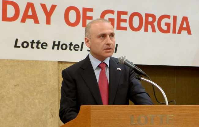 Georgian Ambassador Nikoloz Apkhazava speaks at a national independence day reception at Lotte Hotel on Tuesday. (Joel Lee/The Korea Herald)