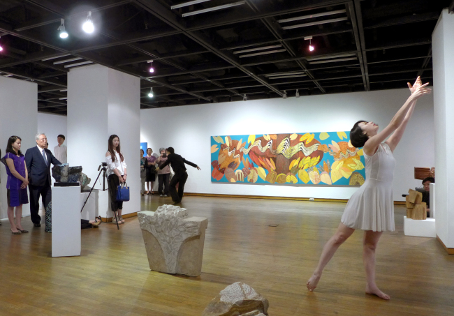 Performance artists from KimBokHee Dance Company display a live show at the exhibition opening at the Hanwon Museum of Art in Seoul on Thursday. (Joel Lee / The Korea Herald)