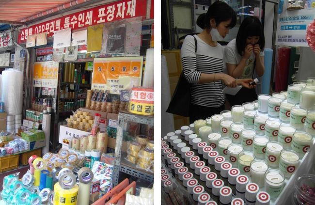 Bangsan Market is filled with stores that sell boxes, shopping bags and tape. (left photo) Customers smell and look at fragrance oil materials for diffusers and candles. (right photo) (Park Hyong-ki/The Korea Herald)