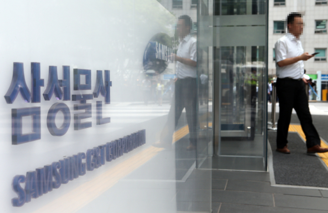 A man walks out of the Samsung C&T office in Seoul on Friday. (Yonhap)