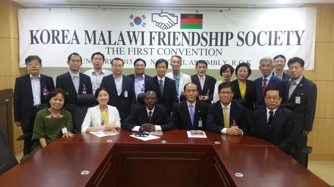 Members of the Korea-Malawi Friendship Society pose at the inaugural ceremony at the National Assembly on Tuesday. (International Development Consulting Group)