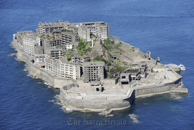 Hashima undersea coal mine off Nagasaki, known as “Battleship Island,” one of the 23 properties of “Japan’s Meiji Industrial Revolution” which were newly listed as World Heritage sites on Sunday. (Yonhap)