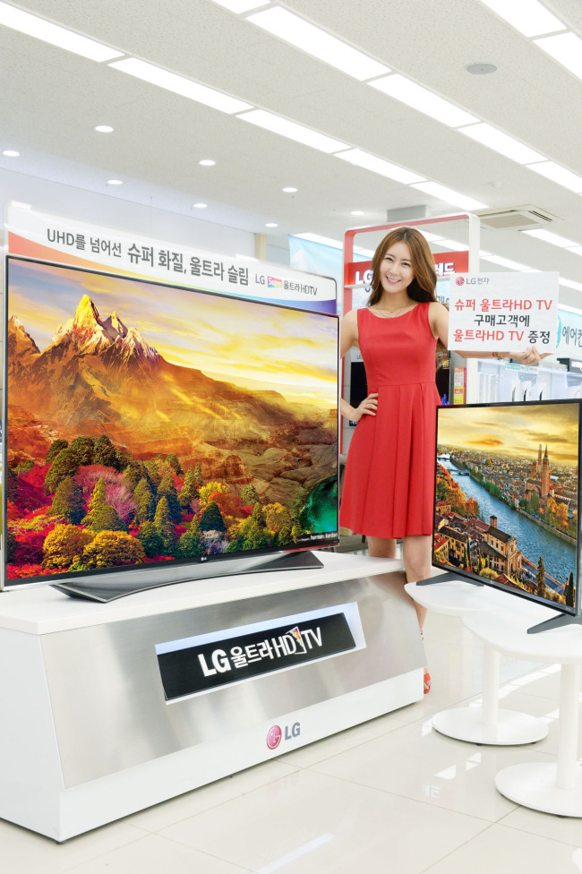 CASHBACK PROMOTION FOR PREMIUM TV -- LG Electronics holds a cashback event for its organic light emitting diode and ultra-high definition TVs through this month, in which consumers can receive up to 2 million won ($1,800) cash back. LGE