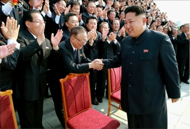 North Korean leader Kim Jong-un meets with heads of North Korea’s overseas missions during a meeting of diplomats, the North’s official Korea Central Television reported Wednesday. (Yonhap)